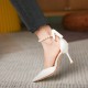White high heels rosette pearl chain