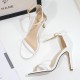 Weiße Riemchensandalen mit hohen Absätzen