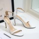 Weiße Riemchensandalen mit hohen Absätzen