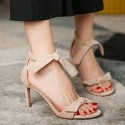 Nude suede bow strap low-heel sandals