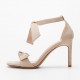 Nude suede bow strap low-heel sandals