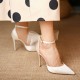 White asymmetric bow pointed high heels