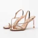 Rose gold strappy heeled sandals
